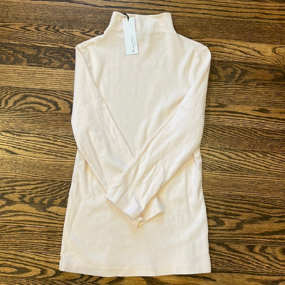 Light blush colored turtleneck. NWT